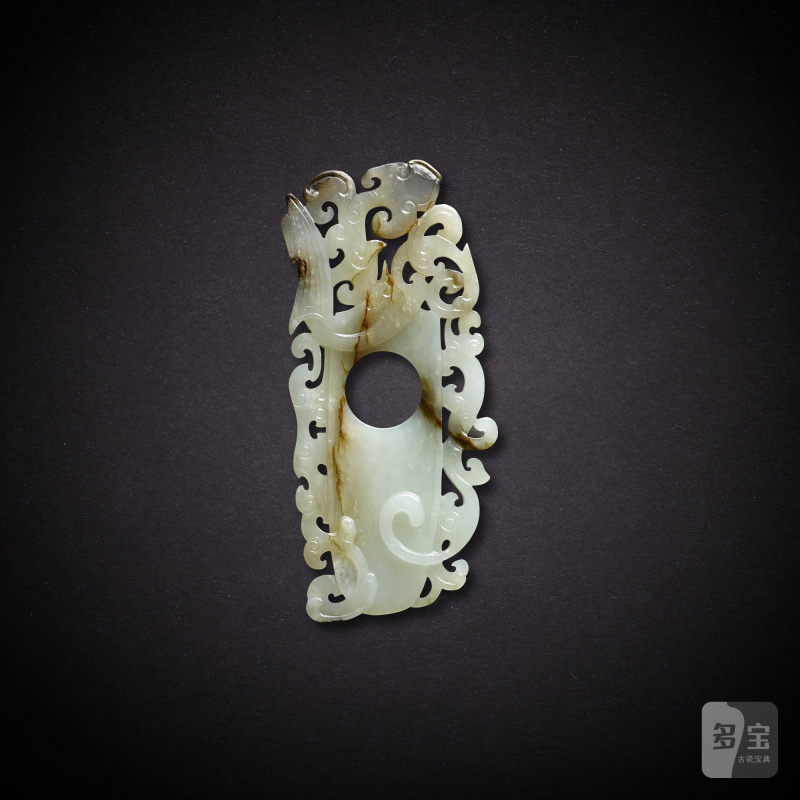 A white jade 'archer's ring' pendant, Eastern Han dynasty or later | 東漢或以後 白玉韘形珮
